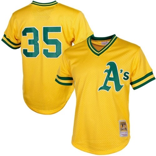 Men's Mitchell and Ness Oakland Athletics #35 Rickey Henderson Replica Gold 1984 Throwback MLB Jersey