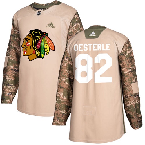 Youth Adidas Chicago Blackhawks #82 Jordan Oesterle Authentic Camo Veterans Day Practice NHL Jersey